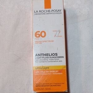 La Roche-Posay Anthelios Ultra Light SPF 60 Face Sunscreen - Orange/White
